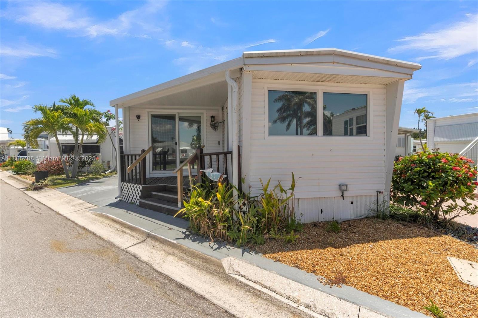 Coastal Living at Its Best in Briny Breezes!
Welcome to this beautifully updated mobile home in the sought-after waterfront community of Briny Breezes. Just steps from the Intracoastal, community pool, and clubhouse, this charming residence offers the perfect blend of comfort and convenience. Inside, you'll find updated flooring throughout, a modern kitchen with sleek finishes, and a stylishly renovated bathroom. The newer roof and full set of impact windows and sliding doors provide peace of mind and energy efficiency. Enjoy the coastal breeze and vibrant community lifestyle in this turnkey home—ideal as a year-round residence or a relaxing beachside retreat!