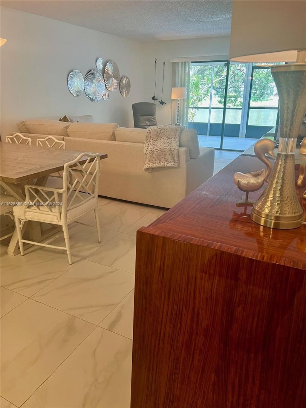 Photo of 2213 Cypress Island Dr #104, Pompano Beach, FL 33069 (MLS # A11625558)