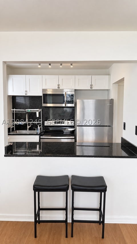 Photo of 1990 Marseille Dr #407, Miami Beach, FL 33141 (MLS # A12084249)