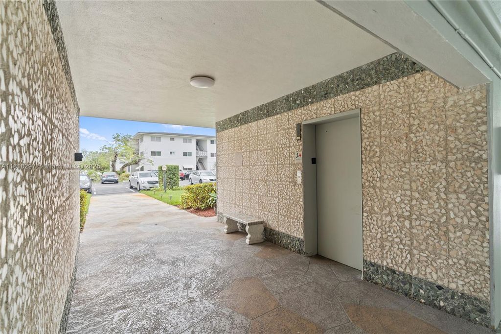 Photo of 1200 Hillcrest Ct #107, Hollywood, FL 33021 (MLS # A11818297)