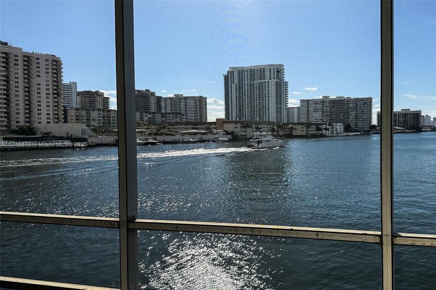 Spectacular Intracoastal and canal views from every room! Gated community. Open kitchen with stainless steel appliances and 24” tile throughout. Enjoy watching the endless boat parade from the unit or screened-in balcony. NEW AC. Tucked away from road noise, offering a peaceful, waterfront lifestyle. 40-year certification complete. Co-op owns the land. Dockage for boats up to 44' through the Association (waitlist). Walk to the beach, shopping, and dining. Conveniently close to Aventura, golf courses, water park, casinos, Hollywood Boardwalk, marinas, Brightline station, and Ft. Lauderdale Airport. Fantastic location!