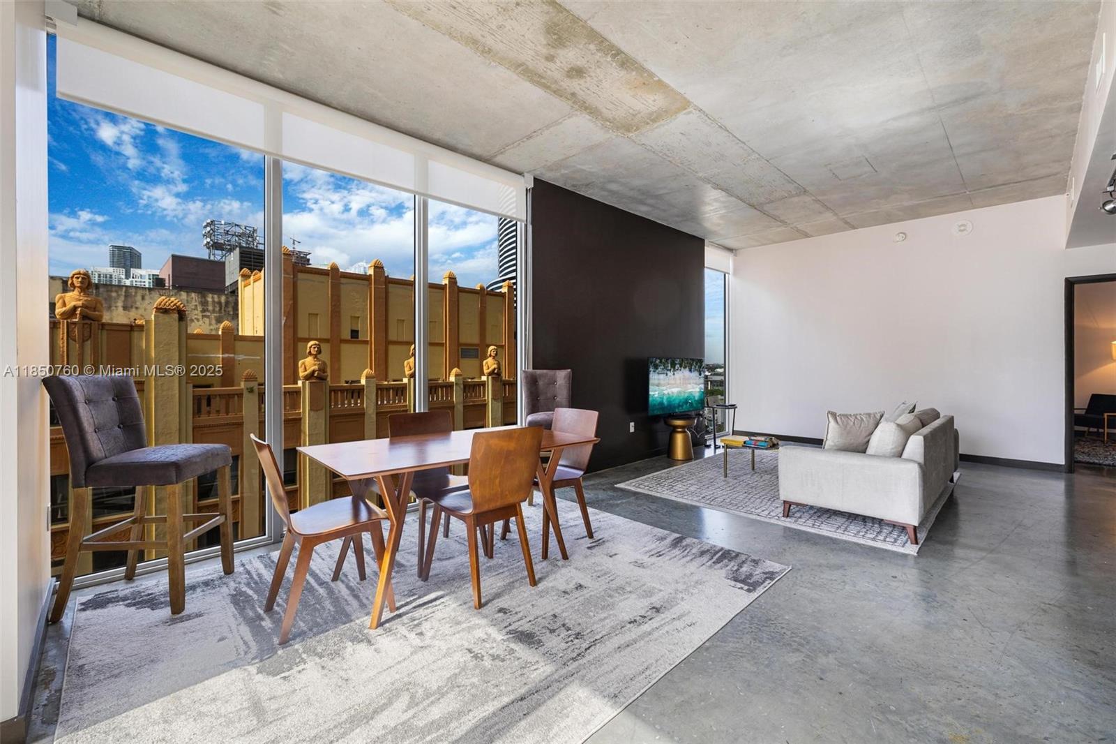 Spacious 2 bed / 2 bath corner loft in the coveted ‘01 line at Centro Condominium. This bright, modern unit features 10-ft floor-to-ceiling windows, private balcony, open kitchen, spa-style baths, polished concrete floors, custom closets, and in-unit laundry.
Images are virtually staged and showcase a similar unit on a higher floor, offering a clear sense of the layout and design. This unit is located on a lower floor.
Centro allows flexible rentals with a 31-day minimum, making it a great option for investors or seasonal use. Full-service amenities include a rooftop pool, gym, sauna, sky lounge, and 24/7 concierge. Walk to Bayfront Park, Metromover, Kaseya Center, and more. Valet and rental parking available nearby.