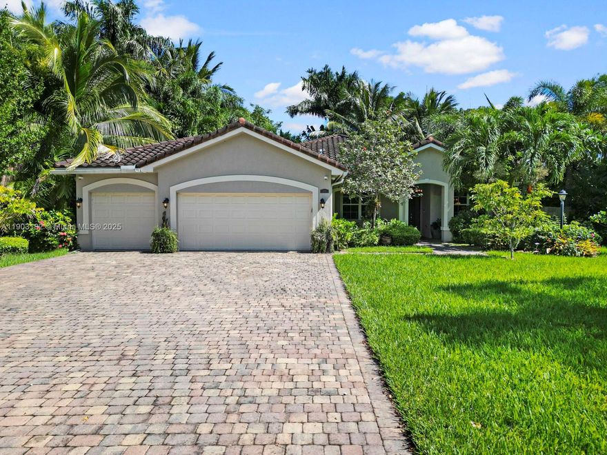 Escape to your own private tropical paradise! This 4-bed, 2-bath home built in 2014 sits on a 1/2 acre lot and offers nearly 2,000 sq ft of living area plus a 3-car garage. The owners have transformed the backyard into a resort-style retreat featuring over 20 species of mature exotic palms ($100k value), a tranquil koi pond, Zen garden, and a full summer kitchen with Green Egg smoker—perfect for entertaining or unwinding in peace. The serene setting is filled with natural shade and the soothing sounds of birds chirping, as rare and exotic species often visit. Plenty of room on both sides for boats, RVs, or work vehicles. Ideally located near the Florida Keys with low HOA and no CDD, this property blends peace, privacy, and practicality in one stunning package. Easy to show!