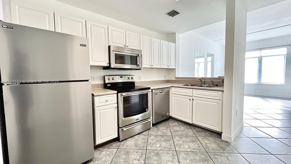 Photo of 1200 Town Center Dr #317, Jupiter, FL 33458 (MLS # A11801583)