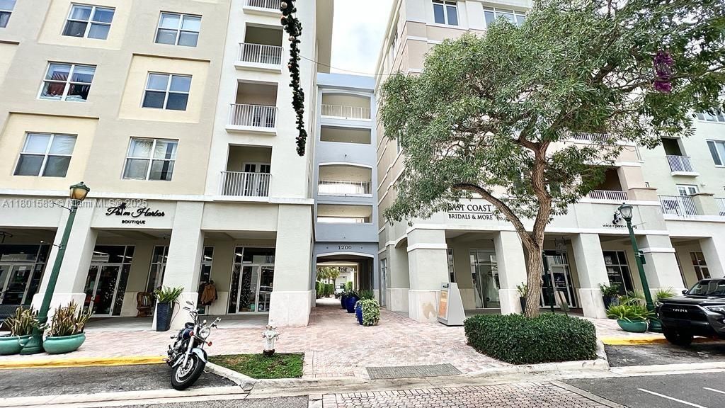 Photo of 1200 Town Center Dr #317, Jupiter, FL 33458 (MLS # A11801583)