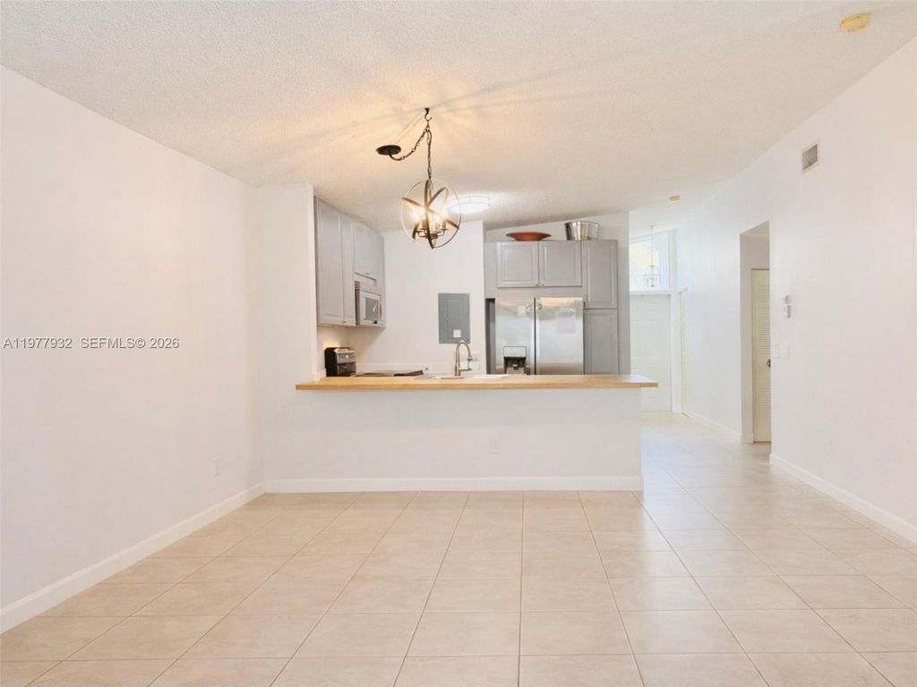 Photo of 614 Woodgate Cir #C, Sunrise, FL 33326 (MLS # A11977932)