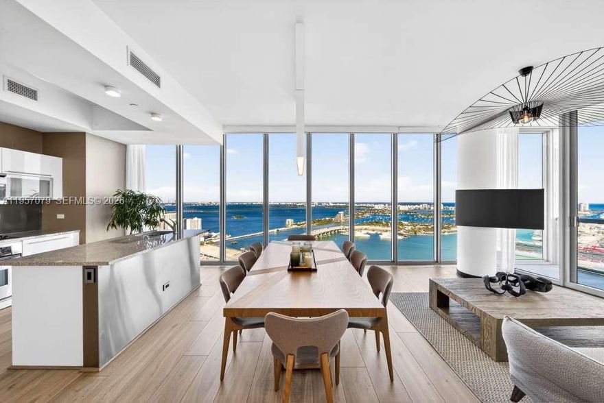 Experience Marina Blue’s coveted 08 line, known for its sweeping, unobstructed views spanning Miami Beach, Edgewater, Brickell, and Downtown Miami. This high floor residence has been thoughtfully updated with brand new flooring and a refined floor plan designed to enhance the living area and fully capture its panoramic exposure. The home offers 2 bedrooms, 2 baths, floor to ceiling glass, electric blackout shades, in unit washer and dryer, and stunning water and skyline views from every room. An additional west facing balcony provides sunset and city light views. Ideally located across from Kaseya Center and one block from Miami Worldcenter, dining, shopping, and the Apple Store. Marina Blue is a modern architectural landmark offering resort style pools, fitness center, business center, jacuzzi, BBQ areas, mini market and CVS on site. Homes in the 08 line are rarely released, making this a truly special opportunity. Easy to show