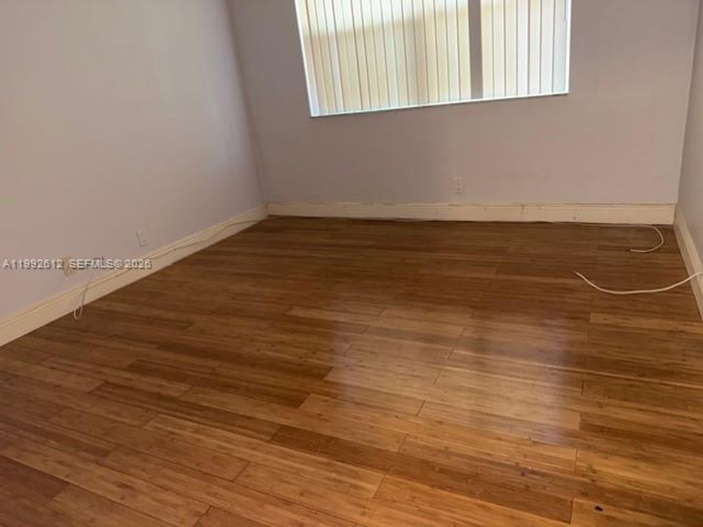 Photo of 8901 Wiles Rd #103, Coral Springs, FL 33067 (MLS # A11992612)