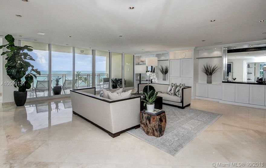 MOST MOTIVATED SELLER. REDUCED BY $1.5M! AND PRICED WELL UNDER MARKET. Enjoy endless water views from this magnificent corner unit with 3,950 SF facing directly the ocean. Unit features private elevator entrance, surround sound system, smart home Creston system, 4 suite bedrooms all with walk in closets and 5 full bathrooms, marble floors throughout, all impact windows and doors, 3 spacious balconies with water views. Exquisitely maintained building offering free valet parking, oversized heated swimming pool and Jacuzzi, tennis court and gym.