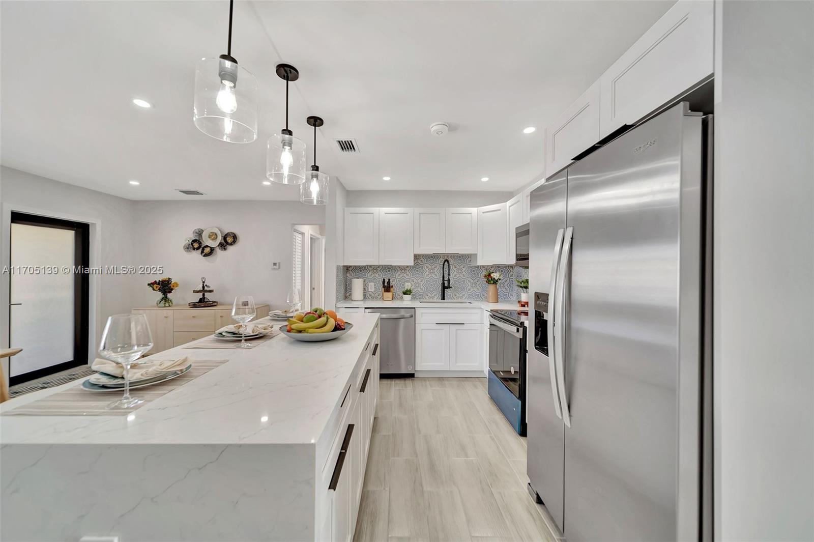 Welcome to a luxurious oasis in highly sought-after Hollywood Beach! This home is essentially a new construction, featuring brand-new, fully permitted updates with a modern flair and exquisite high-end finishes. The open floor plan is designed to check every box on your wishlist.
BRAND NEW roof, NEW impact windows and doors, NEW HVAC system, NEW Appliances, Kitchen, Bath, Walls, Floors, Doors and Closets, NEW EVERYTHING!!!
Let your imagination run wild with the private fourth bedroom, which includes a stunning bonus loft—perfect as an additional rental unit, a private gym, an office, or in-law quarters.
Located in the 33020 area, which has been rezoned for complete redevelopment within the next five years, this is your chance to own a beautiful piece of the future. Don’t miss out!