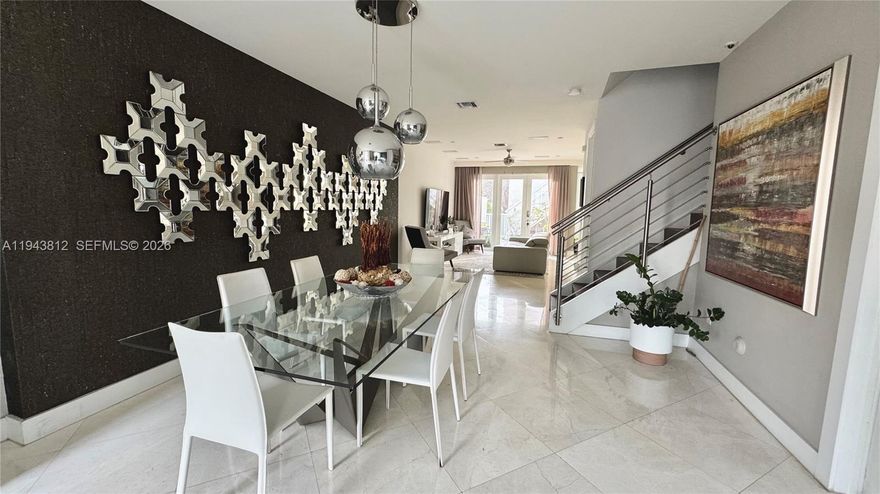 BEST PRICE PER SQFT IN THE MARKET. A luxury 3-bedroom, 3.5-bathroom townhouse with a rooftop and complete separate in-law quarters (Next Gen), located in Landmark Doral. On the entry floor you will find an ample floor plan with space to build another bedroom, a full bathroom, a modern kitchen with stainless steel appliances, the living space, the laundry room, a small storage room, an entry to the 2-car garage, and the first patio. On the second floor, you will find three bedrooms and an open balcony. Going up to the third floor, you will find a half bathroom, a closet for storage, an open balcony, and the rooftop space with a full kitchen (BBQ, electric range, mini fridge, and sink). The in-law quarters has a separate entrance independent from the main home and is currently legally rented. Resort-style clubhouse with pool, hot tub, fitness center, sauna, tennis courts, BBQ area, cabana, and children's splash park. Landmark is in the heart of Doral, where residents enjoy elementary schools, shopping malls, restaurants, and more. It is close to Miami Int’l Airport, Turnpike and the Palmetto Expressway.