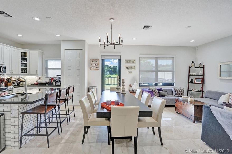 BEAUTIFUL energy-efficient home with over $100k in upgrades! Featuring gorgeous MARBLE and wood-like porcelain tile throughout, IMPACT WINDOWS and doors, recessed lighting with dimmers, GRANITE countertops, stainless steel appliances, subway tile backsplash, custom and remote-controlled blinds, NEW 4-ton A/C, custom-built closets, tankless water heater. Master bath features double vanities, double-headed shower, jetted tub. 2nd-floor laundry room, security camera system and remote keyless entry, NEW electrical panel. SOLAR PANELS to significantly reduce your electric usage! Peaceful backyard with extended brick patio and no neighbors to the back. Security, landscaping, WIFI + best TV package included in HOA! Gated community has jogging trail, tot lots, community pool and more!