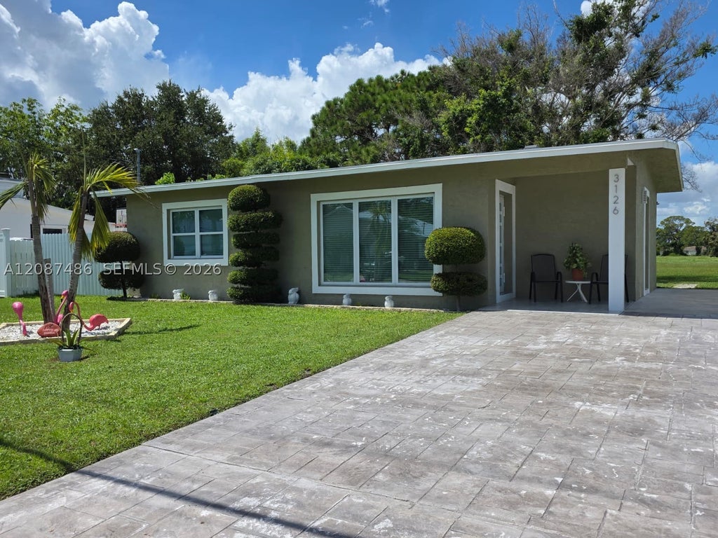 Photo of 3126 SE Monte Vista St, Port St Lucie, FL 34952 (MLS # A12087486)
