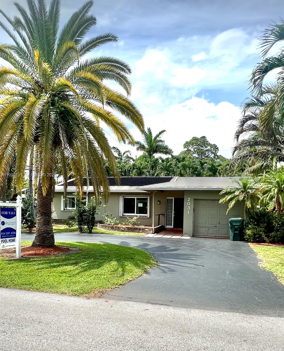 Photo of 2031 NW 32nd St, Oakland Park, FL 33309 (MLS # A11992191)