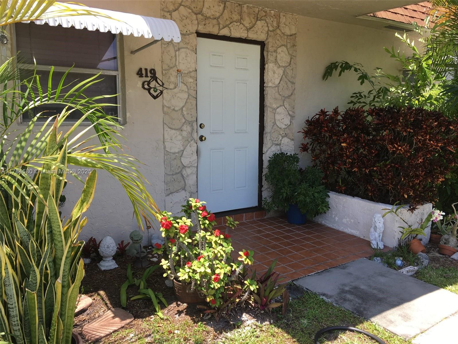 Enjoy the convenience and beauty of a 55+ lakeview first floor one story villa that is steps away from your parking space. This spacious 1 bedroom, 1.5 bath has been exceptionally maintained, clean & spacious with white tile throughout. A full-sized washer/dryer located inside the large screened-in patio overlooks a private garden. This unit boasts a large master bedroom with a walk-in closet and en-suite vanity and bath. Updated hot water heater and kitchen with beautiful granite counter-tops & pass-through bar. Roof was replaced in 2012. There is plenty of closet space in this unit as well. Rent immediately after closing, with low HOA of $316/Month. Seller will pay the $2500 one-time capital contribution for buyer at closing.