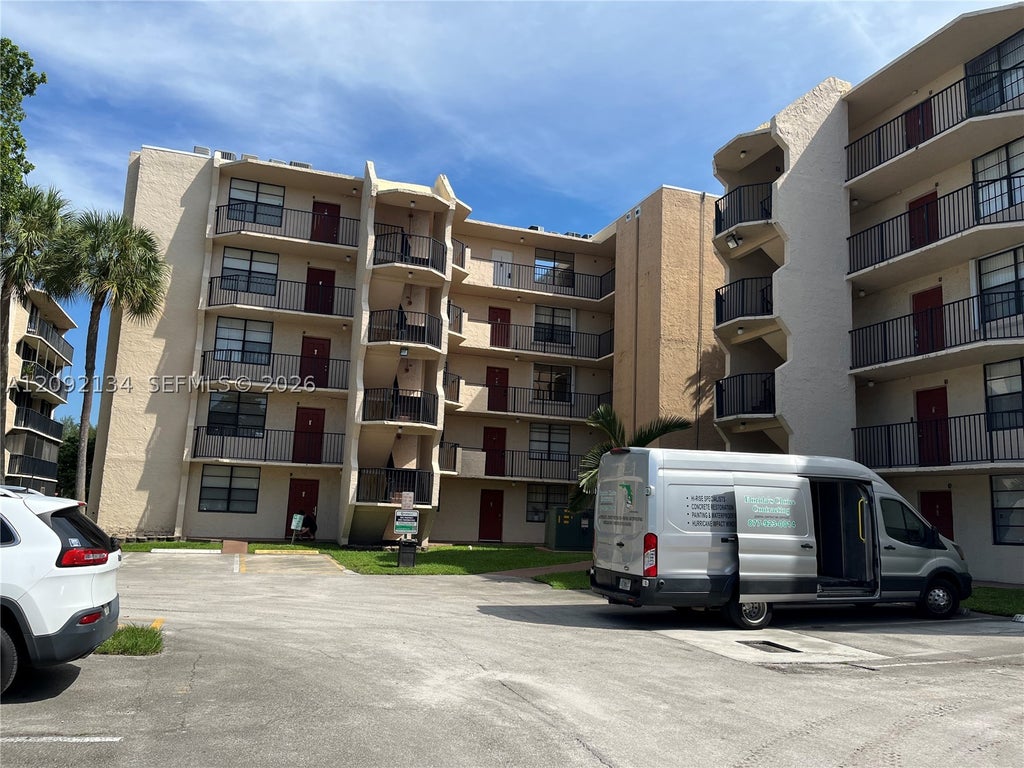 Photo of 3500 Blue Lake Dr #401, Pompano Beach, FL 33064 (MLS # A12092134)