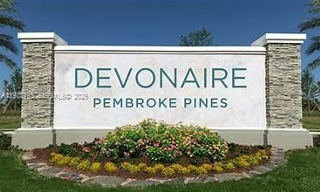 Photo of 11145 SW 6th St #302, Pembroke Pines, FL 33025 (MLS # A11975195)