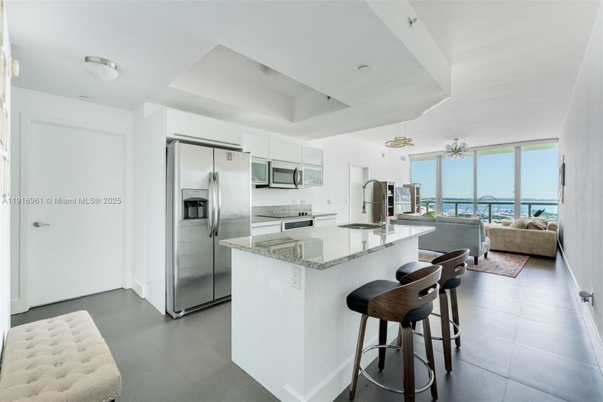 Tastefully updated and move-in ready, this bright residence at Marina Blue offers modern finishes, open layouts, and stunning direct Biscayne Bay views. Enjoy unbeatable location steps from the Miami Heat arena, Miami Worldcenter, Bayfront Park’s concerts and events, Perez Art Museum, Frost Museum, and the waterfront promenade. Marina Blue features state-of-the-art amenities including sunrise & sunset pools, Beach volleyball court, spacious fitness center, yoga studio, clubroom, 24/7 security, valet, and more. Unit includes deeded parking and extra storage. Quick access to Brickell, Wynwood, Design District, Midtown, and Miami Beach makes this an ideal home, pied-à-terre, or investment.