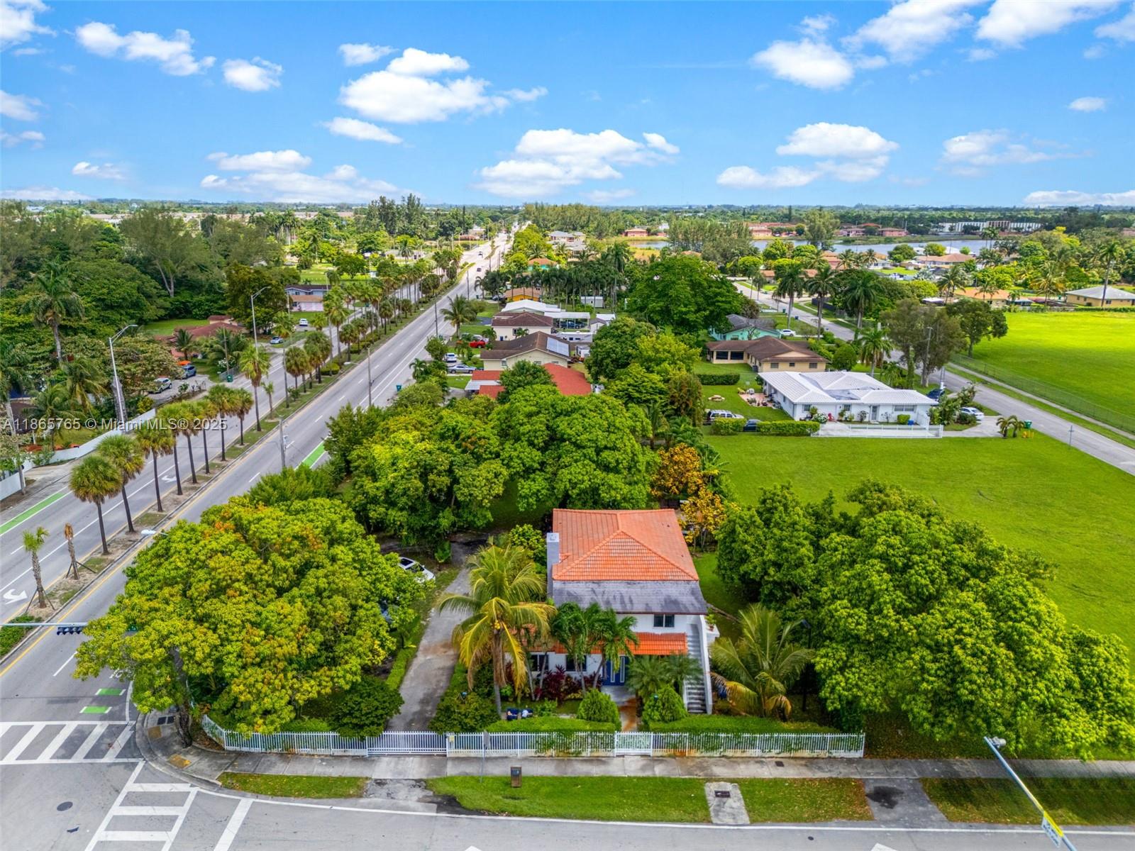 Remodeled property on a 29,900+ SF corner lot with exceptional flexibility for multigenerational living or rental income. Currently configured as 3 units, each with private entrances: (1) 2/1.5 split between first & second floors with full kitchen, dining & living areas; (2) 2/2 on first floor leased at $2,350/mo through 10/31/25 with reliable tenant willing to renew; (3) large 1/1 apartment with spacious kitchen. Units can also be combined into a single-family home if desired. Features impact windows, ample parking, fenced yard, and room for pool. Lot may be subdivided per seller. Easy access to Downtown, expressways, and Miami attractions. Perfect for investors, large families, or buyers seeking flexibility, income, and space in the heart of Miami.