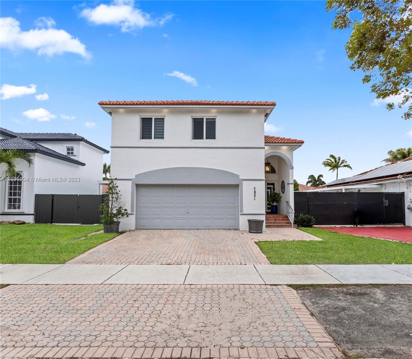 Breathtaking GEM "Turn-key" Gorgeous Professional Renovated and Decorated with Over $100,000 in Elegant Designer Upgrades. Property Features: 5 Bedrooms & 3 Bathrooms, First Floor Efficiency In-Law Quarters. NEW Roof 2020, NEW High Quality Impact Windows and Doors, NEW Upgraded Floors. NEW Bathrooms, NEW Kitchen & Appliances, NEW AC, NEW Marble Bathroom, NEW Zebra Roller Shades, NEW Custom Lighting & Fixtures, NEW Upgraded Backyard/Terrace and Flooring, and NEW Storage Shed. Low Association Maintenance which includes: Lawn Maintenance, Cable Service, Security, and Community Pool.