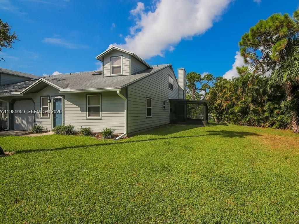Photo of 651 NE Wax Myrtle Way, Jensen Beach, FL 34957 (MLS # A11981009)
