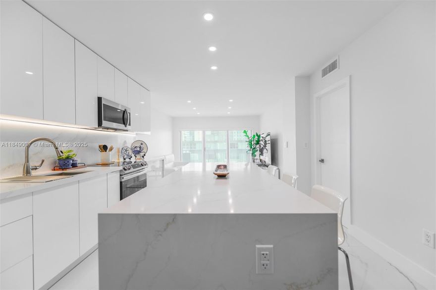 Enjoy coastal living in this completely remodeled seasonal rental at The Hemispheres, located on the 3rd floor of the Ocean South Building. Originally a 1-bedroom, this unit has been converted to a 2-bedroom or den, offering flexibility and comfort. Features include modern finishes, an open kitchen with updated appliances, and porcelain flooring throughout. Relax with north-facing views and take advantage of world-class amenities: beach service, pools, gym, tennis courts, on-site dining, marina access, and more. Just bring your suitcase—everything else is here.