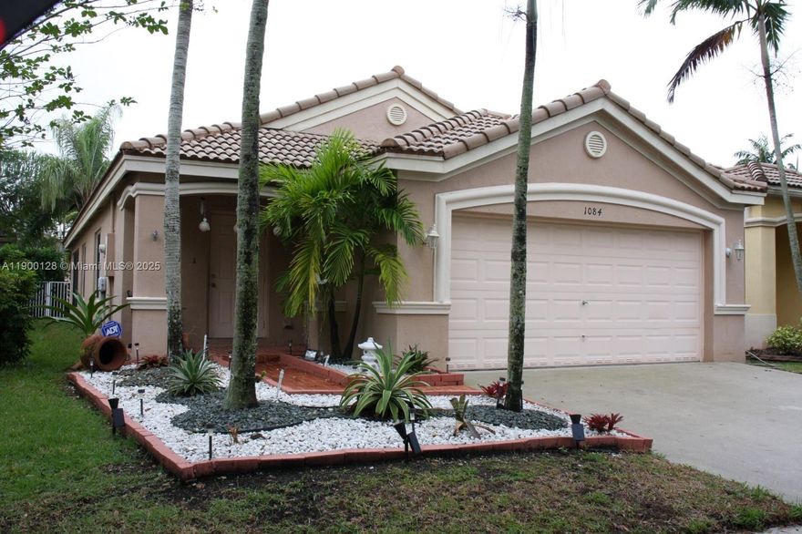 Comfortable and beautiful Home in Savanna, Weston. 3 bed / 2 bath home with tiles in kitchen and upgraded bathrooms. Freshly painted inside and outside.  Wood laminated flooring in bedrooms. 2 car garage, plus 2 extras. Fresh soft colors on walls. Beautiful kitchen with Stainless Steel Appliances. Great relaxing backyard and a covered area with screened patio. Rent Includes access to Resort- Style Community Clubhouse with 2 Pools, Slides and Mini Golf Tennis Courts, Jogging Path, playgrounds, Basketball, Picnic Area, and more. A+ Schools. Community location close to schools, parks, shopping, restaurants and Weston Regional Park. Landlord is motivated!