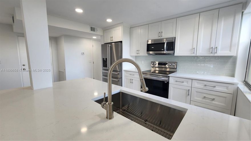 Beautifully updated and freshly painted 4th-floor corner unit featuring new flooring and modern appliances, including a refrigerator, microwave, stove, and dishwasher. Enjoy serene tennis court views from the screened-in patio. Basic internet is included. The building offers a secured entry door for added safety, and the parking lot is well-lit for convenience and peace of mind. Community amenities feature two pools, a jacuzzi, a fitness center, and clay tennis courts offering professional instruction and clinics. Ideally located east of I-95—bike to the beach or downtown Delray, or walk to Whole Foods, Target, Trader Joe’s, and a variety of nearby shops and restaurants.