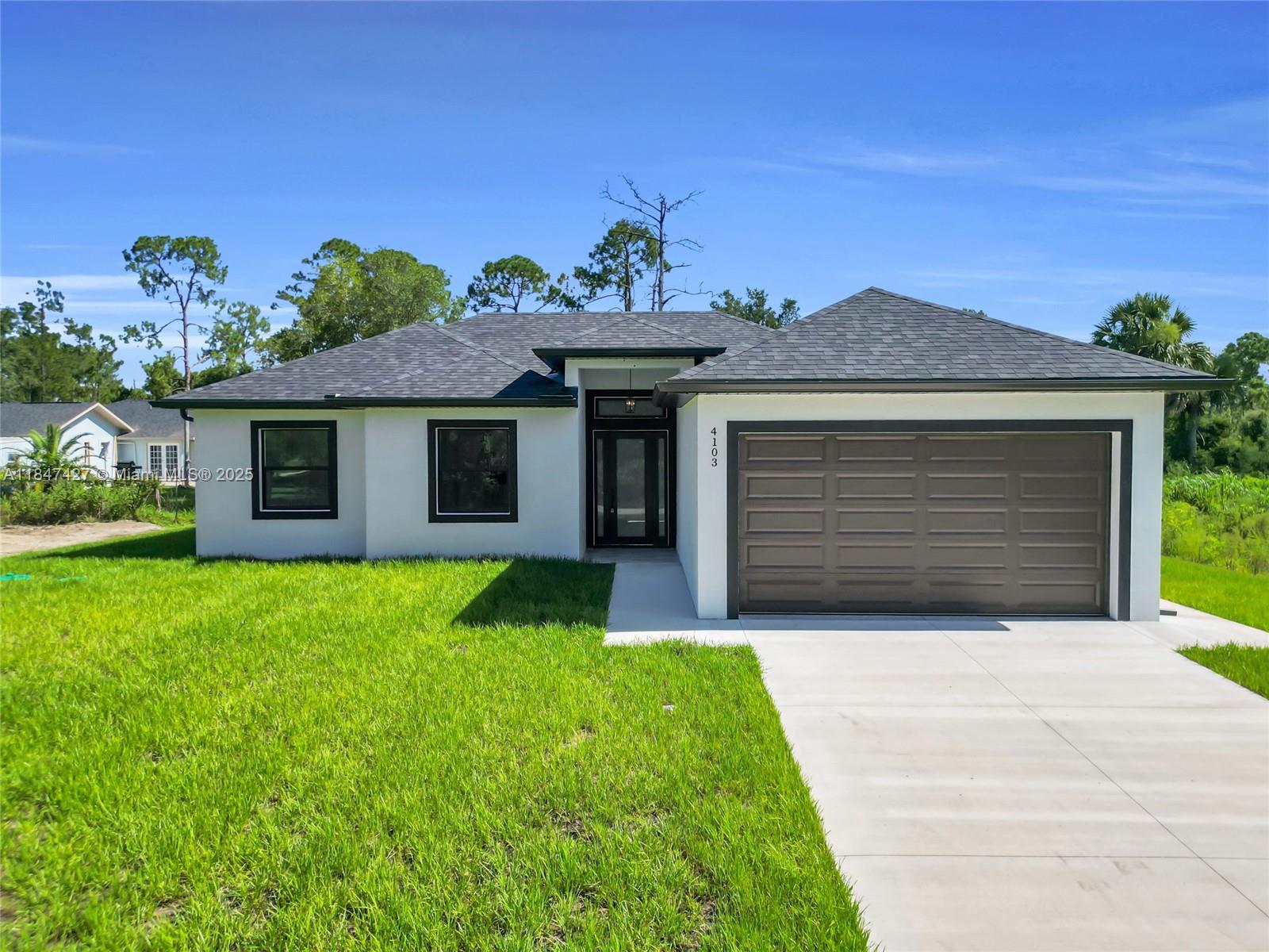 Seller is offering $10,000 in concessions toward buyer's closing costs and prepaid items! This stunning new construction in Lehigh Acres is filled with upgrades and thoughtful details. Underground electricity adds safety and $5,000 in value. Enjoy a decorative accent wall, screened lanai, and epoxy-coated garage floor. The home features 10-ft ceilings, 8-ft doors, impact windows, and sits on an elevated lot in a quiet neighborhood. The kitchen includes elegant countertops, premium cabinetry, and appliances to be installed before closing. Bathrooms are finished with glass shower doors, custom mirrors, and modern fixtures. A water filtration system and advanced septic will also be installed before closing. TV is included with the sale, Don’t miss the opportunity to make it yours!