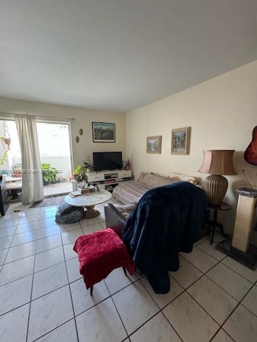 North Beach 1 bedroom with open kitchen, Private balcony that has view of bay and you can even enjoy  seeing the sunsets from the unit. Close to Design District, MIMO, Wynwood, Miami Beach.  Free Miami Beach trolly outside the building as well as Public Bus Transportation. Quiet building with an assigned covered parking. Pets under 20lbs allowed. currently occupied by a long-term tenant.