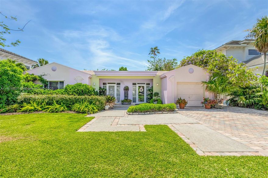 Rare 3 bedroom/3 bath Art Deco waterfront gem in most desirable neighborhood in the Gardens. 200 foot deep lot, 21,531 sf (including deeded canal bottom). Extensively remodeled in 1999. New kitchen, cabinets, quartz countertops, stainless steel appliances, 5 burner gas stove. 
2 master suites with en suite bathrooms. His and hers showers, jetted tubs.  
Terra cotta and natural stone floors. New high efficiency Trane central air units. Wired fo 50 amp generator service.
Huge new composite dock with long water views. 10,000 lb boat lift. Deeded ownership of canal bottom. 10 foot 6 inch elevation, no flooding, excellent proven hurricane protection. Stunning tropical landscaping! Close to beach, restaurants, shopping. No HOA.