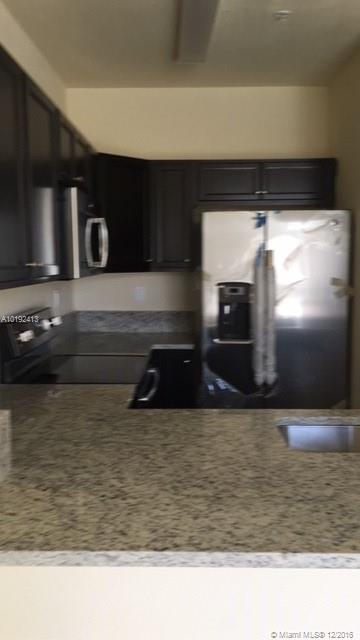 ESPECTACULAR UNIT ON GROUND FLOOR WITH PRIVATE ENTRANCE. TOP OF THE LINE CABINETS AND STAINLESS STEEL APPLIANCES. 3 BEDS, 2.5 BATHS, PATIO AND BIG STORAGE. FIJI CONDO IS A GATED COMMUNITY, CLOSE TO RESTAURANTS, SHOPPINGS AND TURNPIKE.