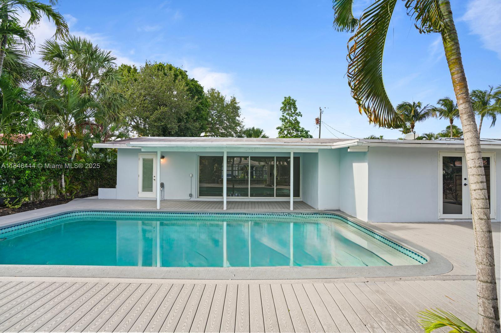 Beautifully renovated 3BR/3.5BA modern home in a prime Fort Lauderdale location—just minutes to Las Olas Beach, FLL Airport & Hard Rock Hotel. Features a private pool, open-concept living, spacious bedrooms, updated kitchen & bathrooms, and impact windows. Enjoy 60 ft of waterfront with a private dock for a large boat and direct ocean access—no fixed bridges! Ideal for boating enthusiasts or investors seeking a high-yield short-term rental. Quick access to major highways. A true waterfront gem!