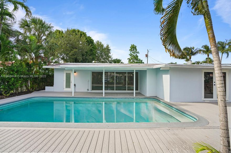 Beautifully renovated 3BR/3.5BA modern home in a prime Fort Lauderdale location—just minutes to Las Olas Beach, FLL Airport & Hard Rock Hotel. Features a private pool, open-concept living, spacious bedrooms, updated kitchen & bathrooms, and impact windows. Enjoy 60 ft of waterfront with a private dock for a large boat and direct ocean access—no fixed bridges! Ideal for boating enthusiasts or investors seeking a high-yield short-term rental. Quick access to major highways. A true waterfront gem!