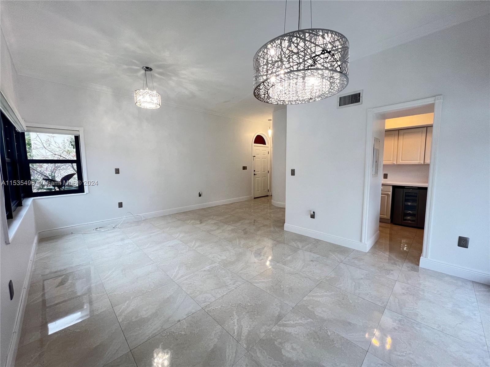 BRICKELL AVENUE! TWO STORY TOWNHOME WITH 2 BEDS, 1.5 BATH. THE FIRST FLOOR HOSTING THE BRIGHT AND SPACIOUS LIVING ROOM-DINING ROOM, MODERN KITCHEN WITH STAINLESS STEEL APPLIANCES, DIRECT ACCESS TO A LARGE PATIO DECK IDEAL FOR ENTERTAINING OR SUN BATHING, AND POWDER ROOM. THE UPSTAIRS WELCOMES YOU TO THE SPACIOUS PRIMARY BEDROOM WITH HIGH CEILINGS, LOFT SPACE AND MODERN  SHOWER BATHROOM, WALKING-CLOSET. THE ADJACENT SMALL TWIN-BEDROOM IDEAL FOR A HOME OFFICE. TWO PARKING SPACES. PRIVACY IN A COMPLEX WITH ONLY EIGHT TOWNHOUSES  THE ULTIMATE CITY LIFESTYLE NEAR RESTAURANTS, SHOPPING AND TRANSPORTATION YET IN AM URBAN OASIS.