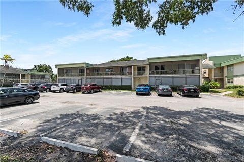 Photo of 4133 NW 88th Ave #106, Coral Springs, FL 33065 (MLS # A11862116)