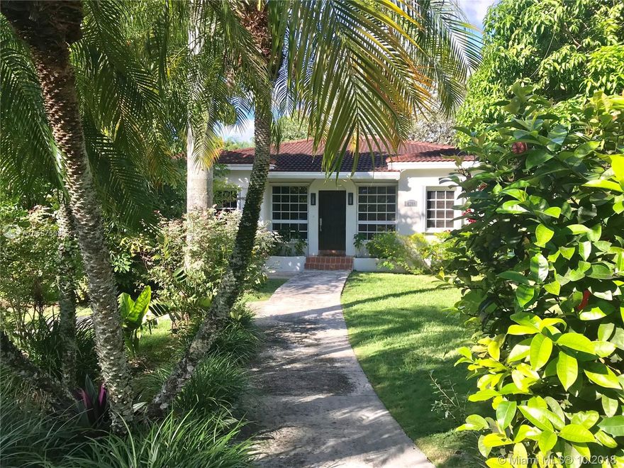 Amazing opportunity for a family looking to move to beautiful South Miami area - close to everything! Formal foyer takes you through an open living space with split floor plan, ceramic tile and wood floors throughout, engulfed in a lushly landscaped yard with expansive back and side yards, 2 car garage with laundry room and air-conditioned exercise room. Separate room in the back to function as an office or in-law quarters. Near Coral Gables, Palmetto Expressway, US1. Great schools. A lovely place to create new memories!