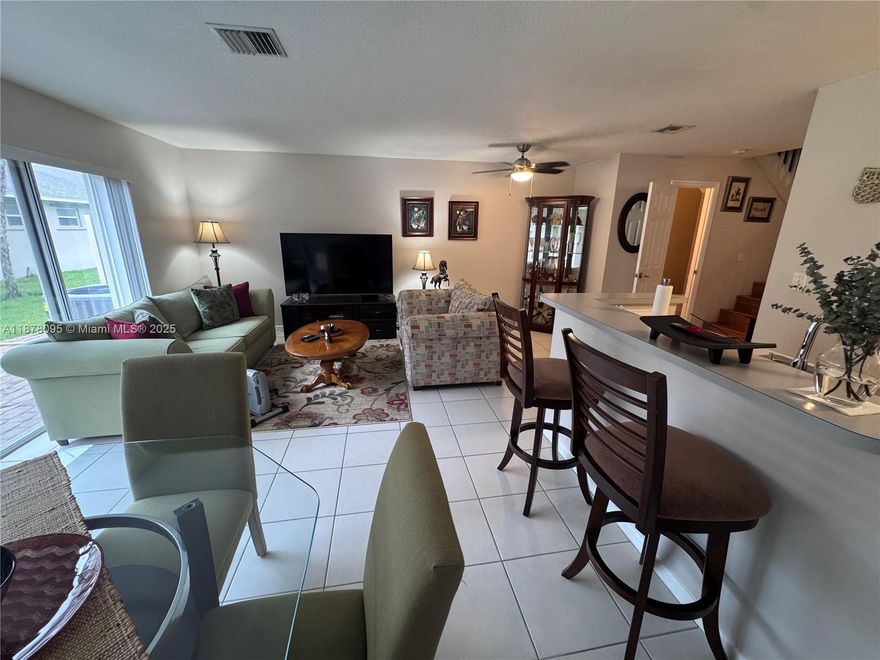 Discover this beautiful 3-bedroom, 2.5-bath townhouse in Sunrise—just steps from Sawgrass Mills Mall, top-rated schools, parks, and dining. With all bedrooms upstairs, vaulted ceilings, tile and wood flooring, and a spacious layout, this home offers comfort and style. Enjoy peace of mind with a 6-year-old roof and low HOA fees that cover roof maintenance, exterior painting, homeowners insurance, yard care, trash pickup, and access to the community pool. The pet-friendly neighborhood features plenty of guest parking, one assigned spot, and no HOA approval required—making it easy to move in and start living! Side storage adds convenience, and the location near the Sawgrass Expressway makes commuting a breeze. This is the perfect blend of value, location, and lifestyle—don’t miss out!