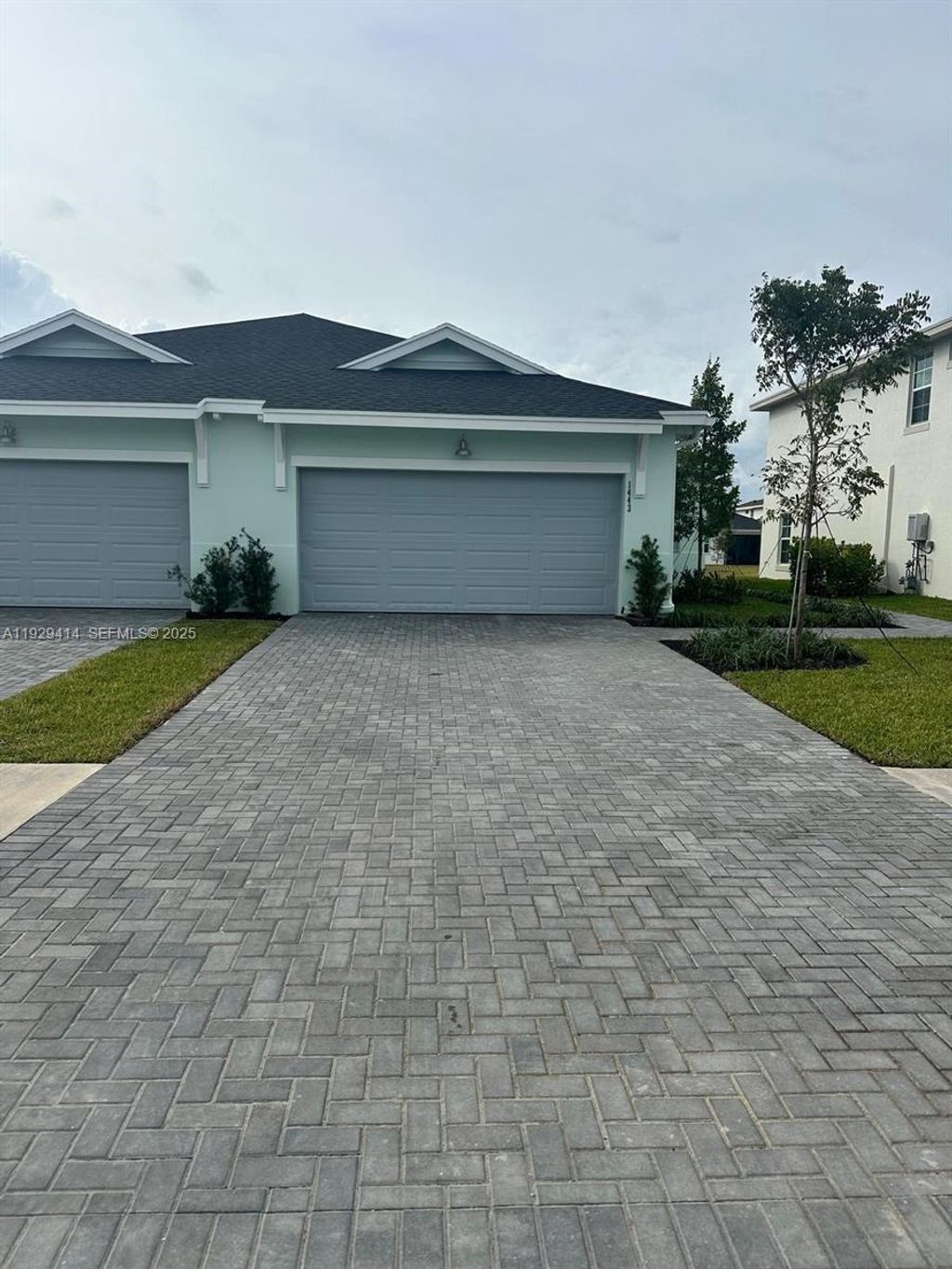 Photo of 1443 Tangled Orchard Trce #1443, Loxahatchee, FL 33470 (MLS # A11929414)