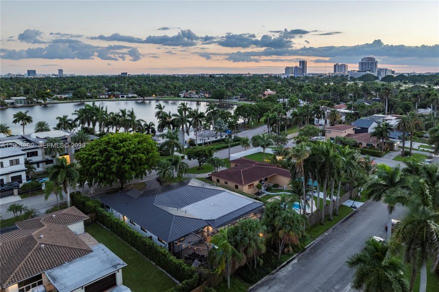 Welcome to this beautifully renovated 4,000 sq ft home located in the exclusive North North Lake block of Hollywood Lakes. Featuring a brand-new metal roof and all impact doors and windows, this home combines durability, style, and peace of mind. The open layout showcases elegant upgrades throughout, including a modern kitchen and spacious living areas perfect for entertaining. With 7 bedrooms, 4 bathrooms, a 2-car garage, and a private backyard with no rear neighbors, this residence offers exceptional comfort and privacy. Just minutes from beaches, fine dining, and shops, this home is a rare find in one of Hollywood’s most sought-after neighborhoods.