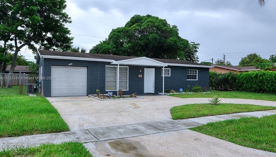 Nice 2 bedroom and 2 bathroom home in a quiete area of Lauderhill. This property features a circular driveway and a 1 car garage. Spacious interior with updated finishes though out. Fruit trees in the back yard. Schools near by 
Great property to make it your home.