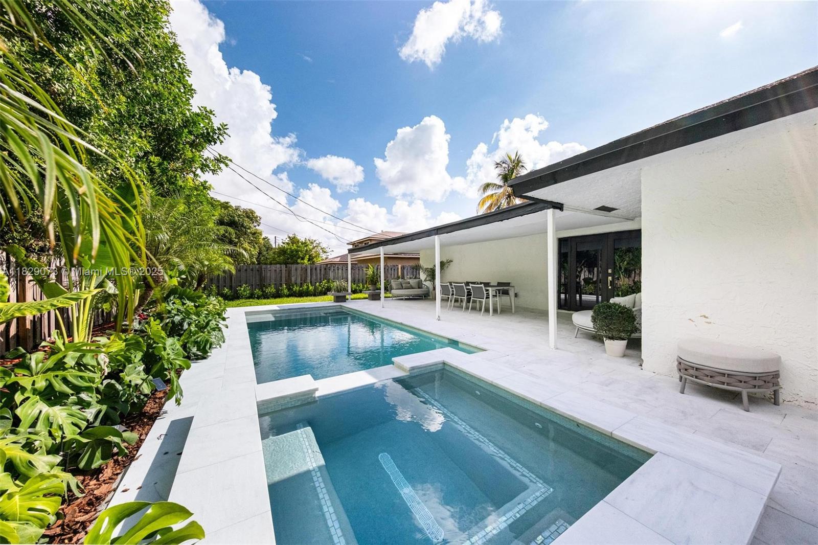 Nestled at the end of a serene cul-de-sac, this meticulously renovated 4-bed, 4-bath home features an open layout connecting the modern kitchen and living areas, perfect for entertaining. A brand-new pool and freshly redone landscaping create a private backyard oasis. Each room offers ample storage, and the split floor plan provides balance and privacy. With a one-year-old A/C, high-impact windows and doors, and no front neighbors, comfort and peace of mind are guaranteed. Currently a very lucrative Airbnb, this home can also be sold fully furnished for a turnkey investment. Move-in ready and ideally located near top schools, highways, and more.