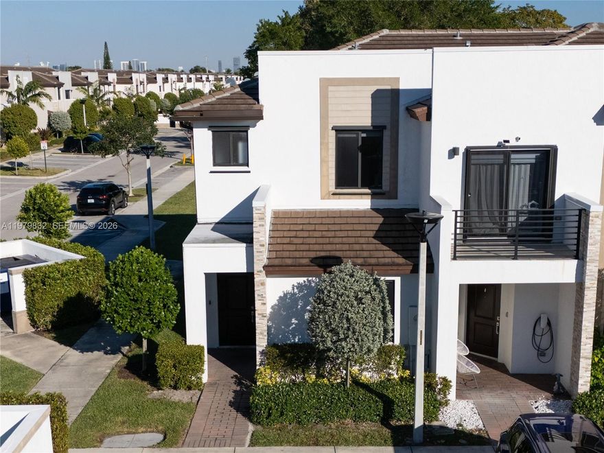 Corner unit located in a gated community, featuring 3 bedrooms and 3 bathrooms. One bedroom with a full bathroom is conveniently located on the first floor. Brand new vinyl flooring on the stairs and throughout the second floor. In addition to being a corner unit, the property offers extra privacy with no neighbors behind. The home also features a private patio and two assigned parking spaces. Enjoy spectacular community amenities overlooking a beautiful lake, where you can relax and take in beautiful sunsets. Perfectly located close to the beaches, Aventura Mall, restaurants, and much more. Don’t miss this great opportunity!