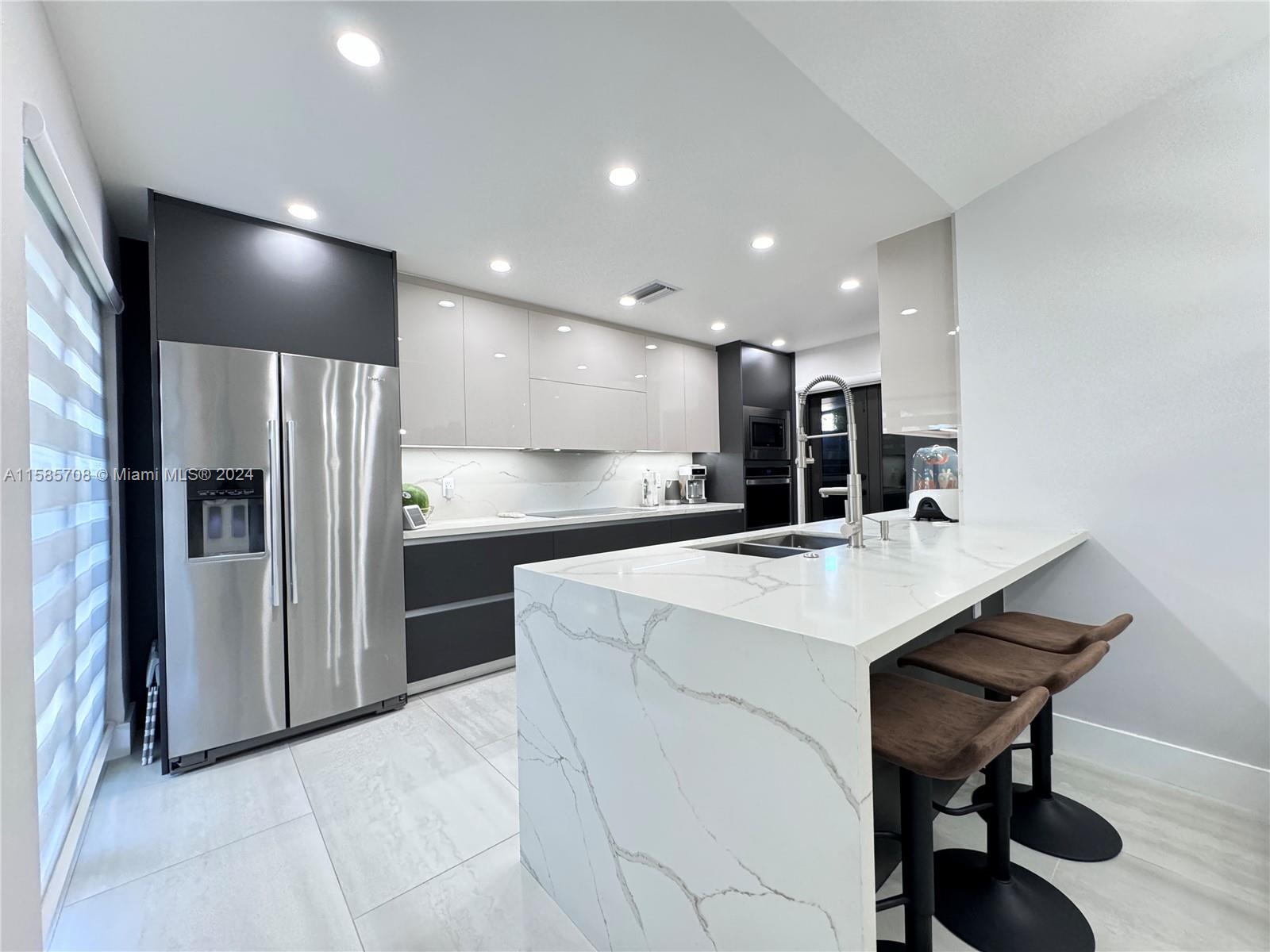 Discover the epitome of renovated luxury in this stunning villa situated in the prestigious The Moors community. This pristine, move-in-ready home features 3 bedrooms, 2 bathrooms, included cable service, and two designated parking spots. The property boasts an outdoor kitchen set within a spacious, private backyard with no back neighbors—perfect for hosting sunny or shaded gatherings. The Moors community elevates your lifestyle with exceptional amenities like a secured gate, professional security, well-kept walkways, several swimming pools, tennis courts, and a state-of-the-art gym, offering a resort-like experience right at home.