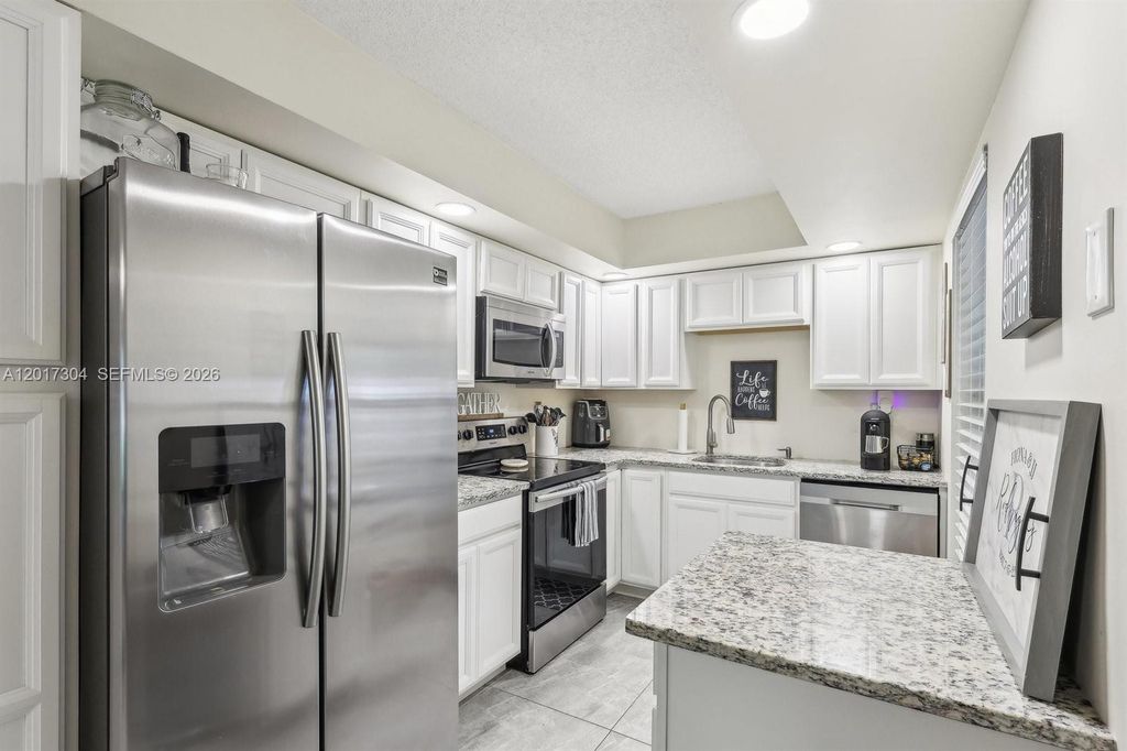 Photo of 301 Olivewood Pl #O130, Boca Raton, FL 33431 (MLS # A12017304)