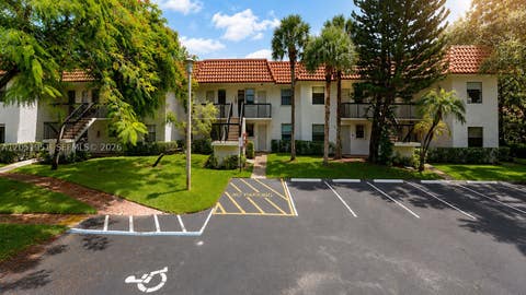 Photo of 15701 W Waterside Cir #205, Sunrise, FL 33326 (MLS # A12051951)