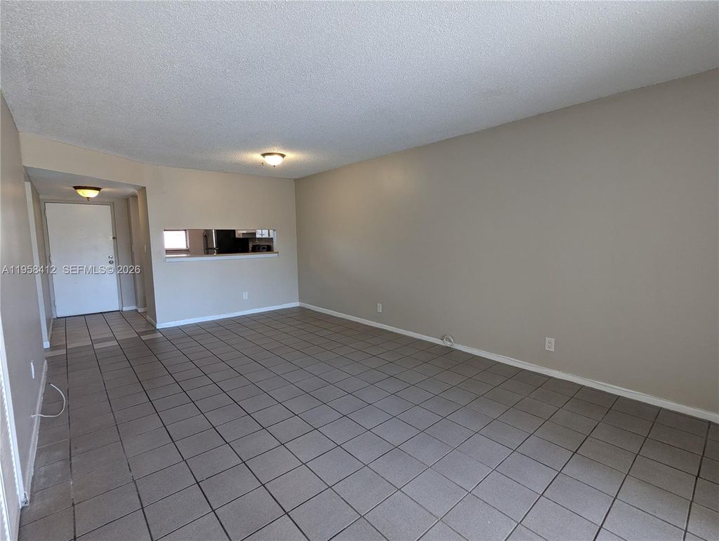 Photo of 3400 Foxcroft Rd #213, Miramar, FL 33025 (MLS # A11958412)