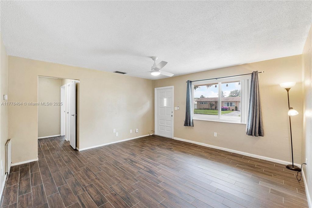 Photo of 8391 NW 27th Pl, Sunrise, FL 33322 (MLS # A11778404)