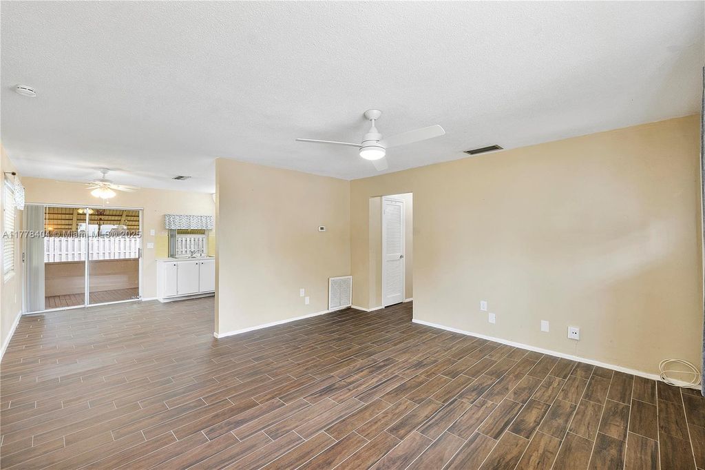 Photo of 8391 NW 27th Pl, Sunrise, FL 33322 (MLS # A11778404)