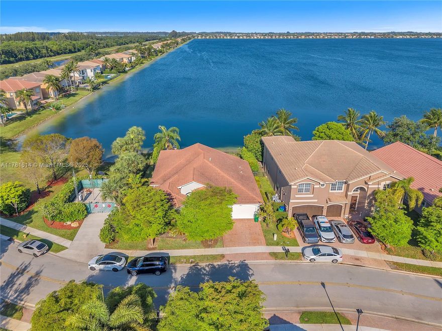 f you're searching for the ultimate waterfront lifestyle — look no further. This breathtaking 4bdrm 3 bth home is a dream come true and priced rightr. Wake up to stunning water views and an abundance of natural light that fills every corner of the home. The kitchen features sleek white ountertops and ss appliances. Immerse in your own private paradise w/a heated pool framed by the beauty of serene waterfront vistas .Nestled in a prestigious, low-HOA community with resort-style amenities, a manned security gate, and easy access to premier shopping and top-rated schools, look no futher. Come see why this is the one you've been waiting for. Your waterfront dream begins here. OPEN HOUSE 4/26 2-6PM
Would you like a version tailored for a social media post, flyer, or listing description too?